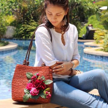 Women&#039;s handmade woven straw bag handbag with flower leaves berries blossoms