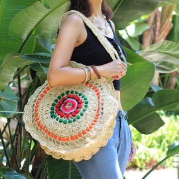 Women&#039;s handmade round straw bag handbag with pom poms and embroidery