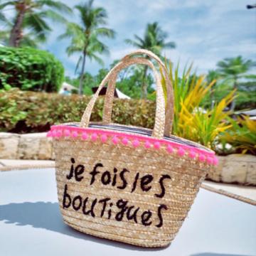 Women&#039;s handmade woven summer beach straw bag with pom poms emboridery tassel