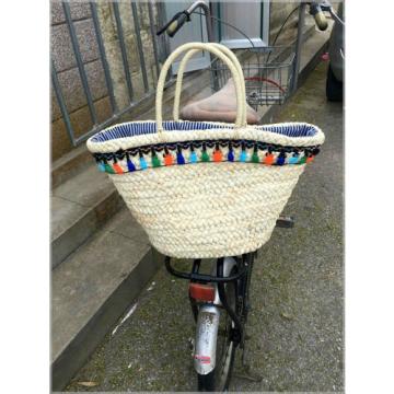 Women&#039;s handmade summer beach large straw bag with colorful tassels