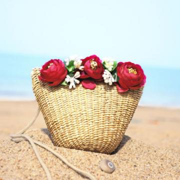 Women handmade woven summer beach mini straw bag with flowers leaves blossoms