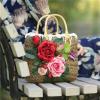 Women&#039;s handmade summer beach straw bag with rose flowers berries blossoms