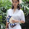 Women&#039;s handmade straw clutch bag handbag with pom poms and tassel