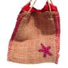 Natural jute beach bag with red silk lining with pull string for closing