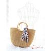 Women&#039;s handmade boho bohemian summer beach round straw bag with round handles