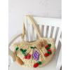 Women&#039;s handmade large summer beach straw bag with crocheted fruits and pom pom