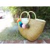 Women&#039;s handmade woven round straw bag beach summer bag with big pom pom tassels