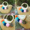 Women&#039;s handmade woven round straw bag beach summer bag with big pom pom tassels