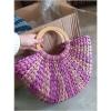 Women&#039;s handmade summer beach round woven straw bag with wooden handles