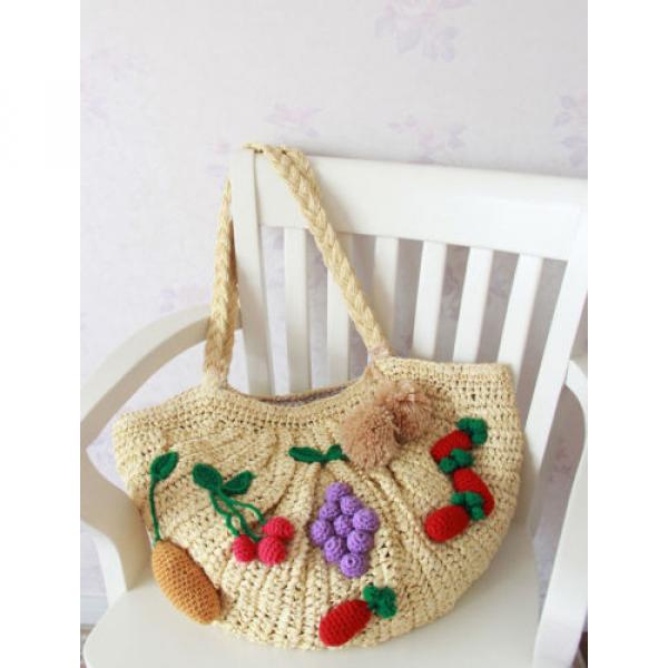 Women&#039;s handmade large summer beach straw bag with crocheted fruits and pom pom #1 image